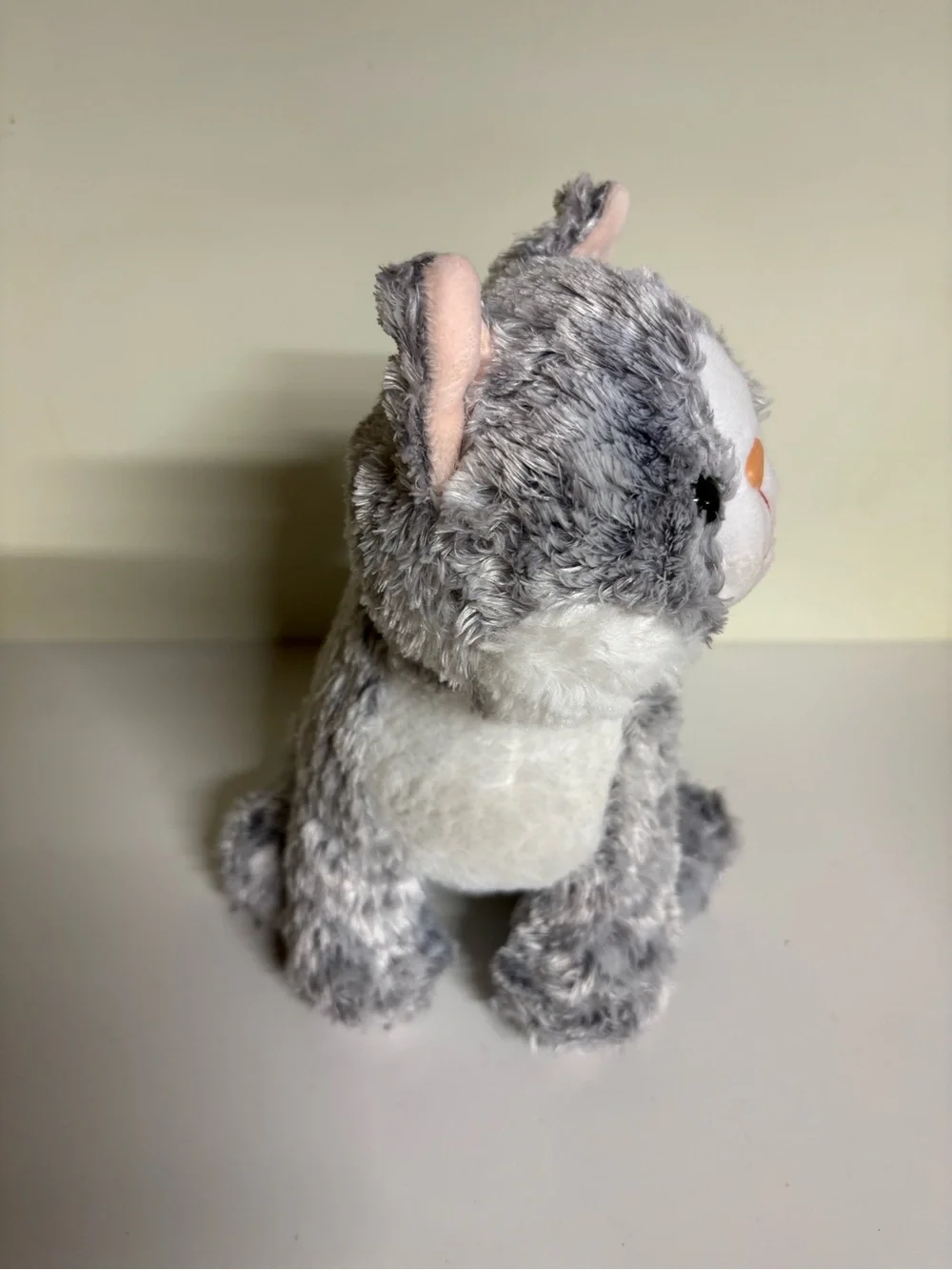 Melissa & Doug Greycie Tabby Cat, featuring soft grey and white patterned fur